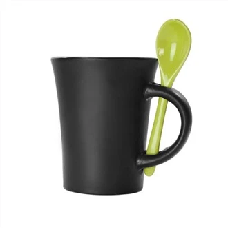 Keramisk kaffemugg och sked